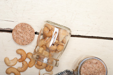 Image showing cashew nuts on a glass jar 