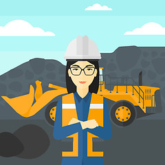 Image showing Miner with mining equipment on background.