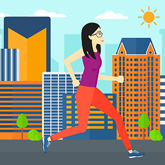 Image showing Sportive woman jogging.