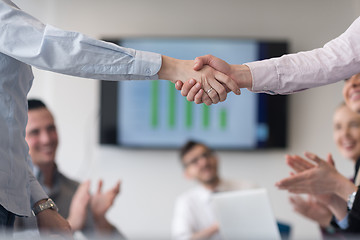 Image showing business womans handshake