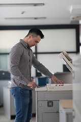 Image showing young  business man copy documents