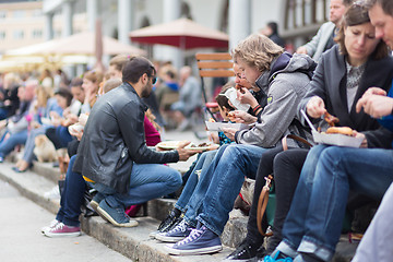 Image showing People enjoing outdoor street food festival in Ljubljana, Slovenia.