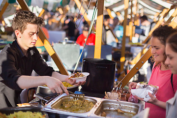 Image showing People enjoing outdoor street food festival in Ljubljana, Slovenia.