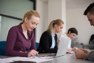 Image showing young business people group on team meeting at modern office