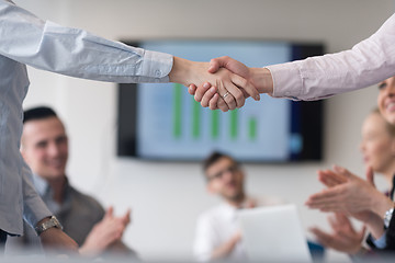 Image showing business womans handshake