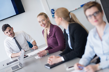 Image showing young business people group on team meeting at modern office