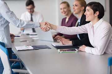 Image showing business womans handshake