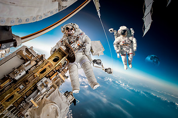 Image showing International Space Station and astronaut.