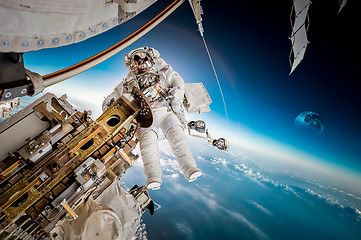 Image showing International Space Station and astronaut.