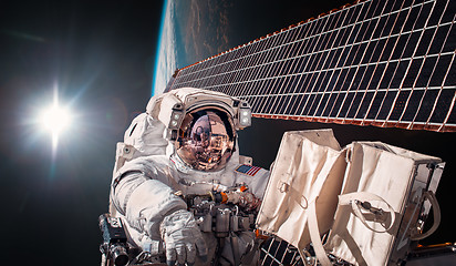 Image showing International Space Station and astronaut.