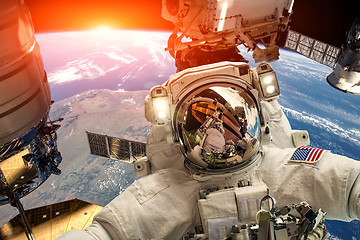 Image showing International Space Station and astronaut.