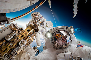 Image showing International Space Station and astronaut.