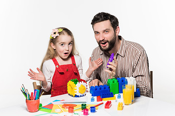 Image showing Father and daughter playing educational games together 