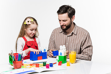 Image showing Father and daughter playing educational games together 