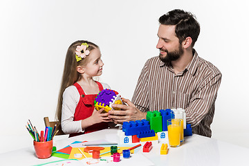 Image showing Father and daughter playing educational games together 