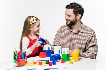 Image showing Father and daughter playing educational games together 