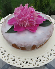 Image showing Cake with glazing and Peony