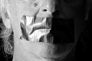 Image showing black and white mouth duct taped shut