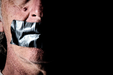 Image showing duct tape over mouth of man