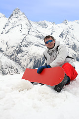 Image showing Smiling snowboarder