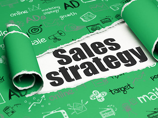 Image showing Marketing concept: black text Sales Strategy under the piece of  torn paper