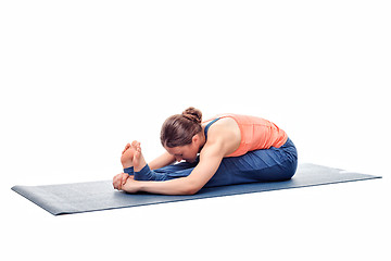 Image showing Sporty woman practices Ashtanga Vinyasa yoga asana 