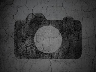 Image showing Tourism concept: Photo Camera on grunge wall background