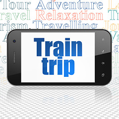 Image showing Travel concept: Smartphone with Train Trip on display
