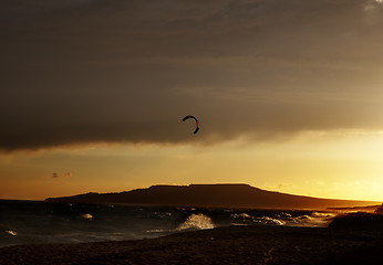 Image showing Silhouette of power kites at sunset 