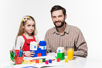 Image showing Father and daughter playing educational games together 