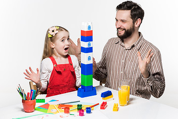 Image showing Father and daughter playing educational games together 