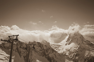 Image showing Sepia mountains and ski lift