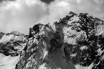 Image showing Black and white winter mountains in cloud