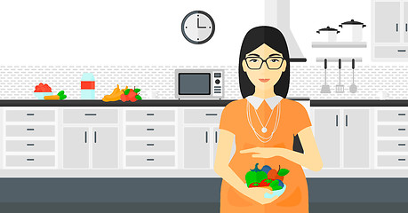 Image showing Pregnant woman with vegetables.