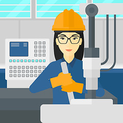 Image showing Woman working with industrial equipment.