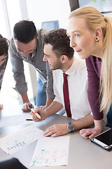 Image showing young business people group on meeting at modern office