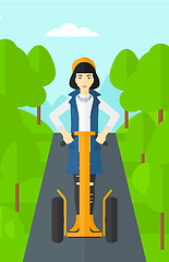 Image showing Woman riding on electric scooter.