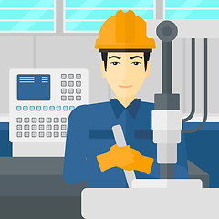 Image showing Man working with industrial equipment.