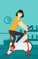 Image showing Woman doing cycling exercise.