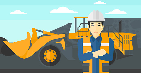 Image showing Miner with mining equipment on background.