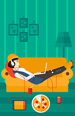 Image showing Woman lying on sofa with many gadgets.