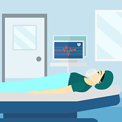 Image showing Patient lying in hospital bed with heart monitor.