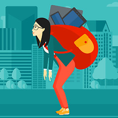 Image showing Woman with backpack full of devices.