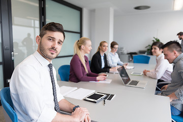 Image showing young business people group on team meeting at modern office