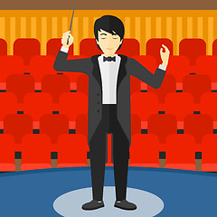 Image showing Conductor directing with baton.