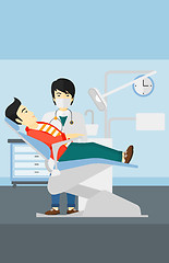 Image showing Dentist and man in dentist chair.