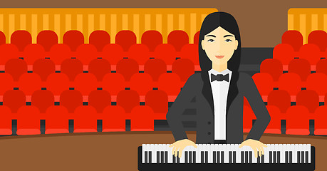 Image showing Woman playing piano.