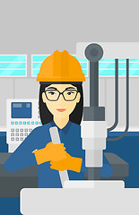 Image showing Woman working with industrial equipment.