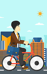 Image showing Man cycling to work.