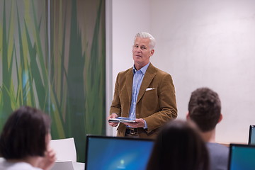 Image showing teacher and students in computer lab classroom